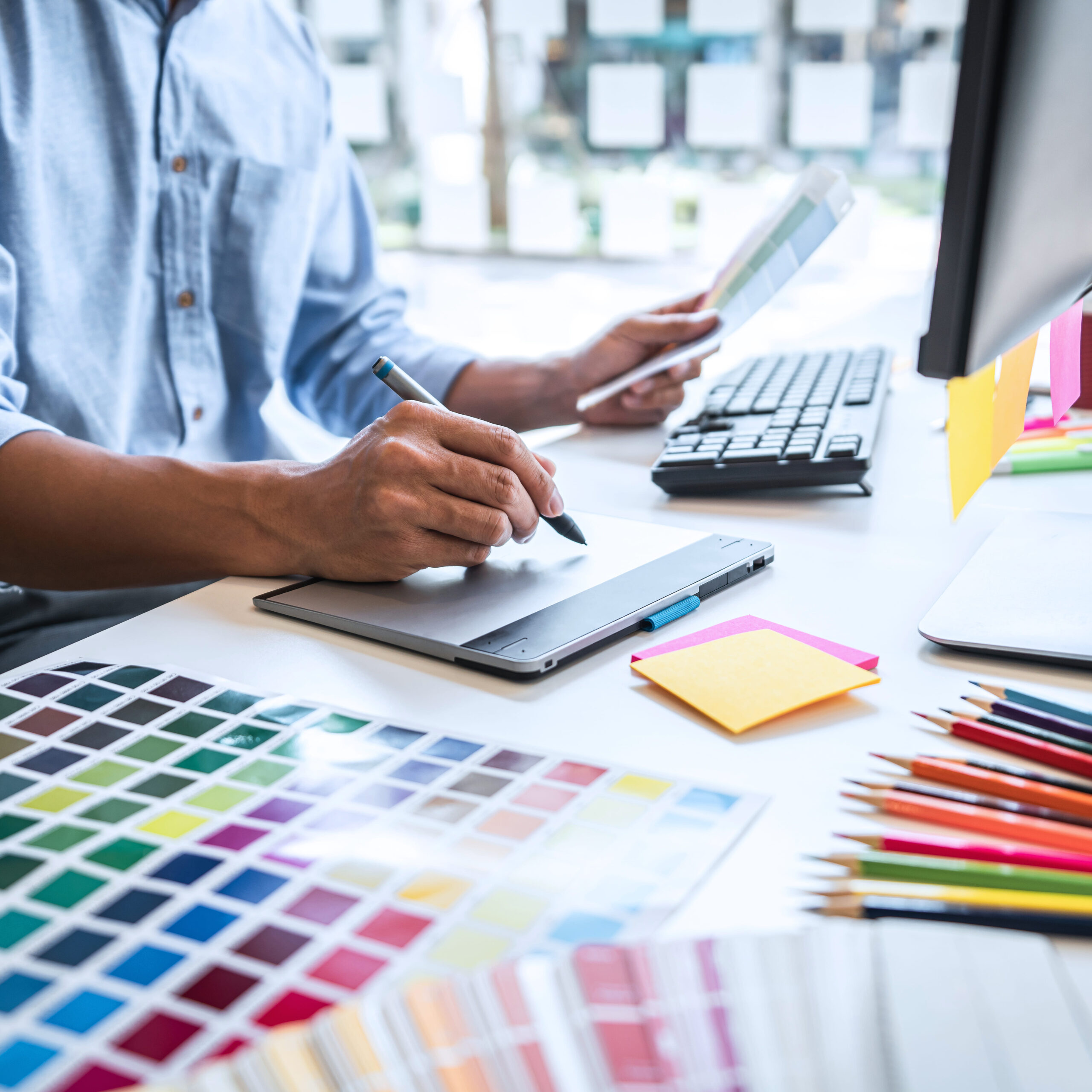 graphic-designer-working-at-desk-with-color-swatch-2026-01-11-08-39-37-utc (1) graphic-designer-working-at-desk-with-color-swatch-2026-01-11-08-39-37-utc (1)